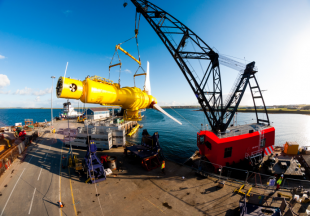 DeepGen IV turbing being lifted from harbour to sea for deployment